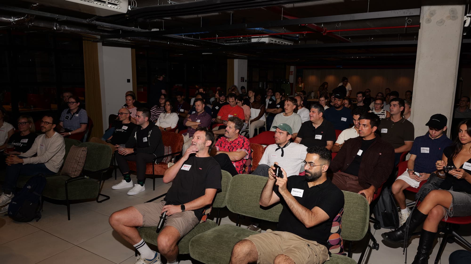 Attendees listening to a talk at Netlify Barcelona