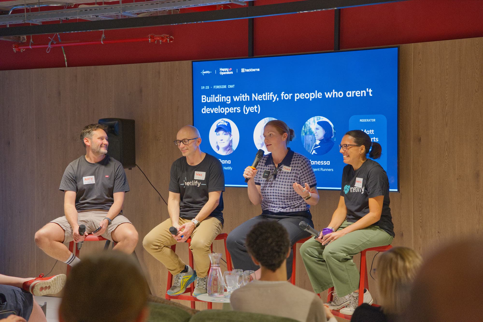 Speakers discussing building with Netlify on stage
